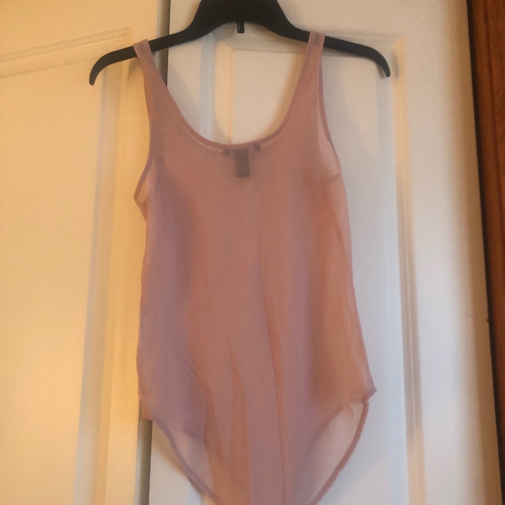 Scoop neck, mesh bodysuit! Two snaps on the bottom